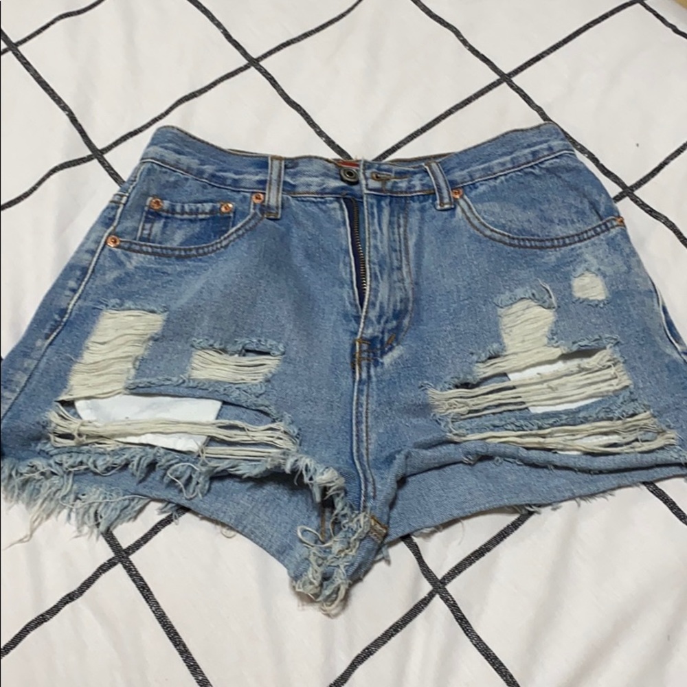 High waisted distressed denim jeans